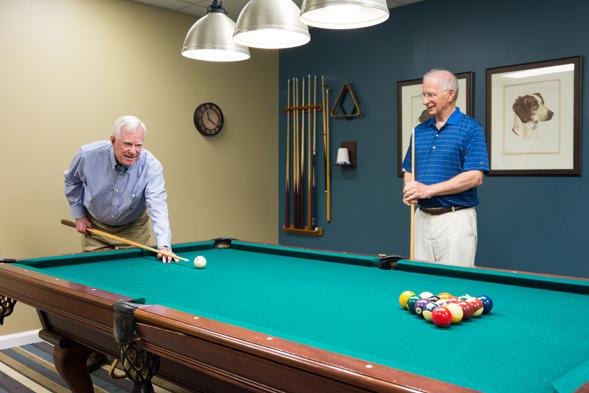 residents playing billiards