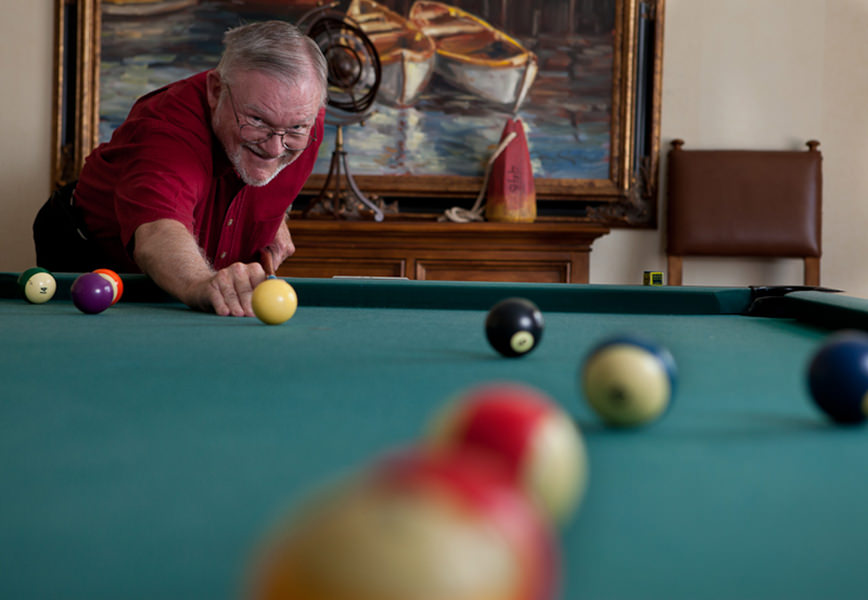 resident playing billiards