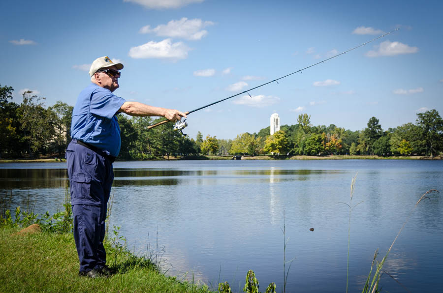 resident fishing at a pond