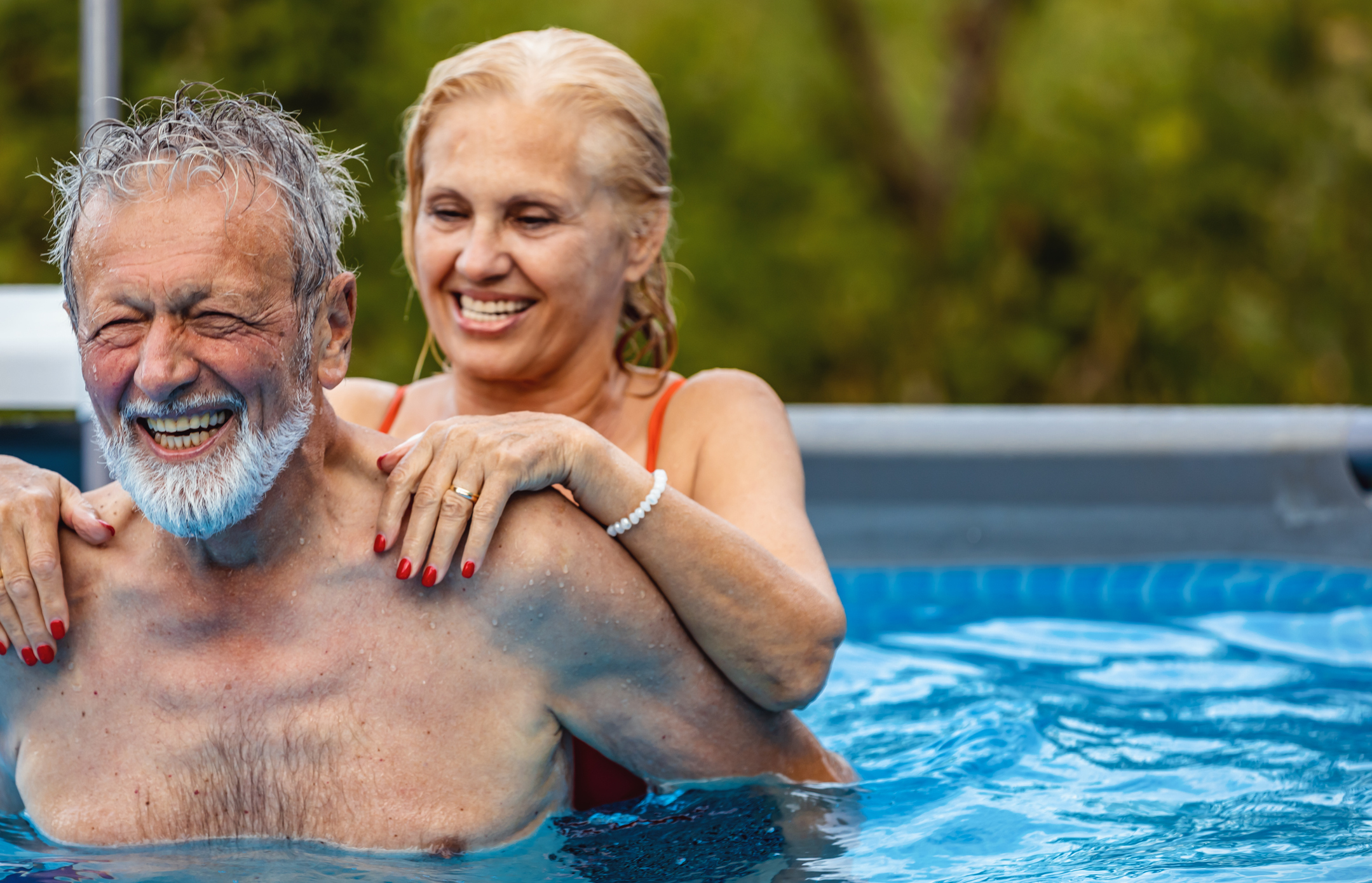 Older Couple In Pool